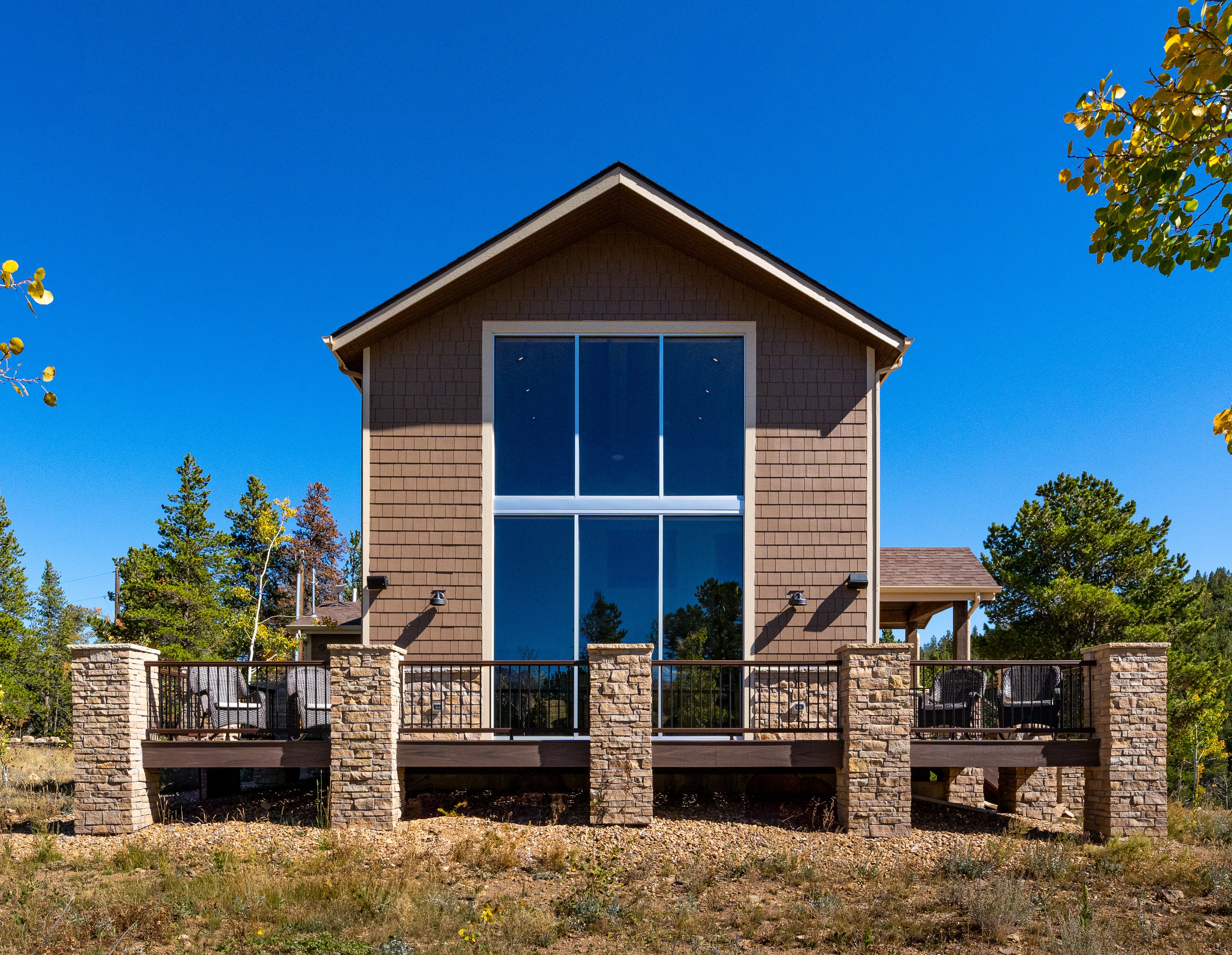 large porch with a custom home in Ward Colorado