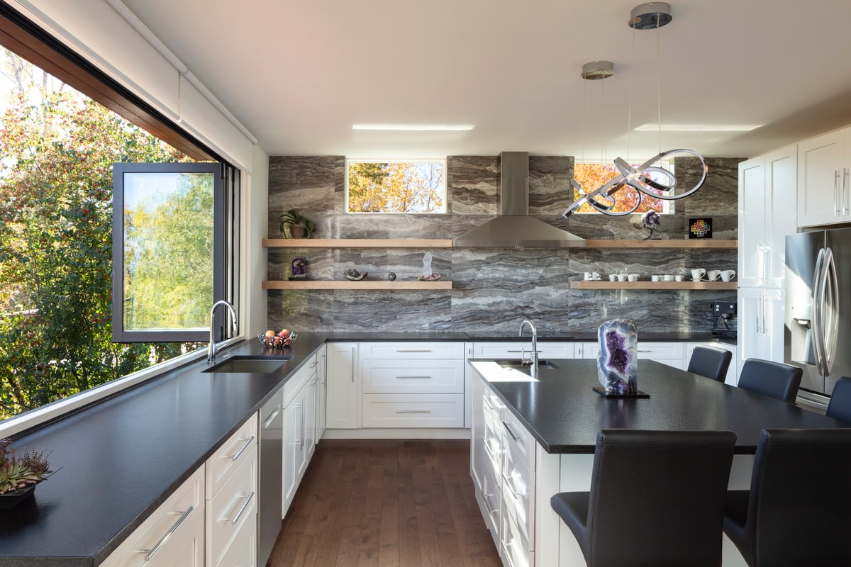 Boulder Colorado remodeled kitchen with stacking windows that open to the scenic views