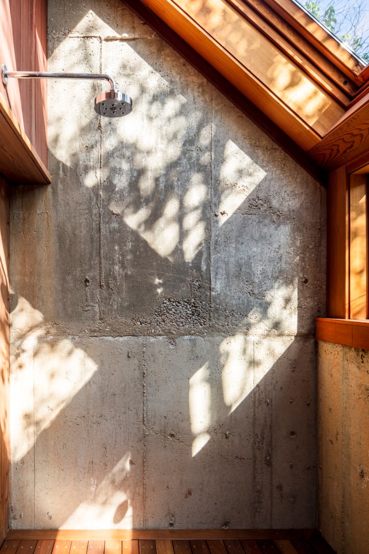 shower with glass windows and mountain views