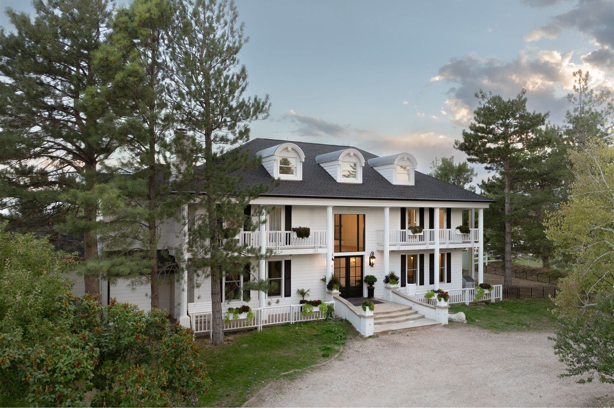 Large St. Vrain Colorado home with double balcony and a large entrance