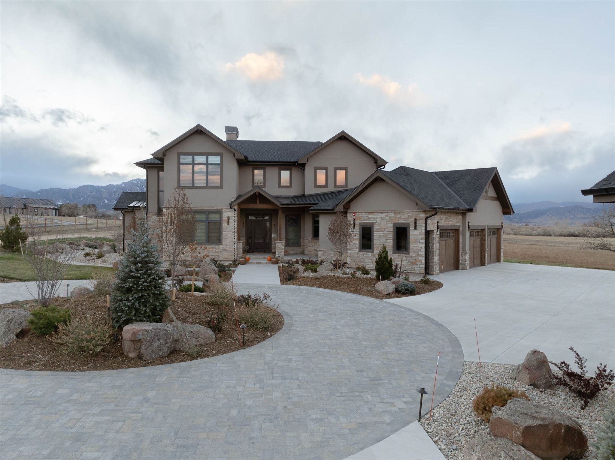 exterior shot of a custom build colorado home with brown and tan aesthetic