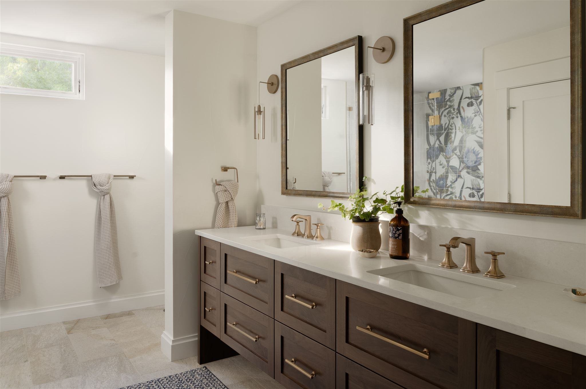 Boulder bathroom remodel with brown double sink vanity and double mirror
