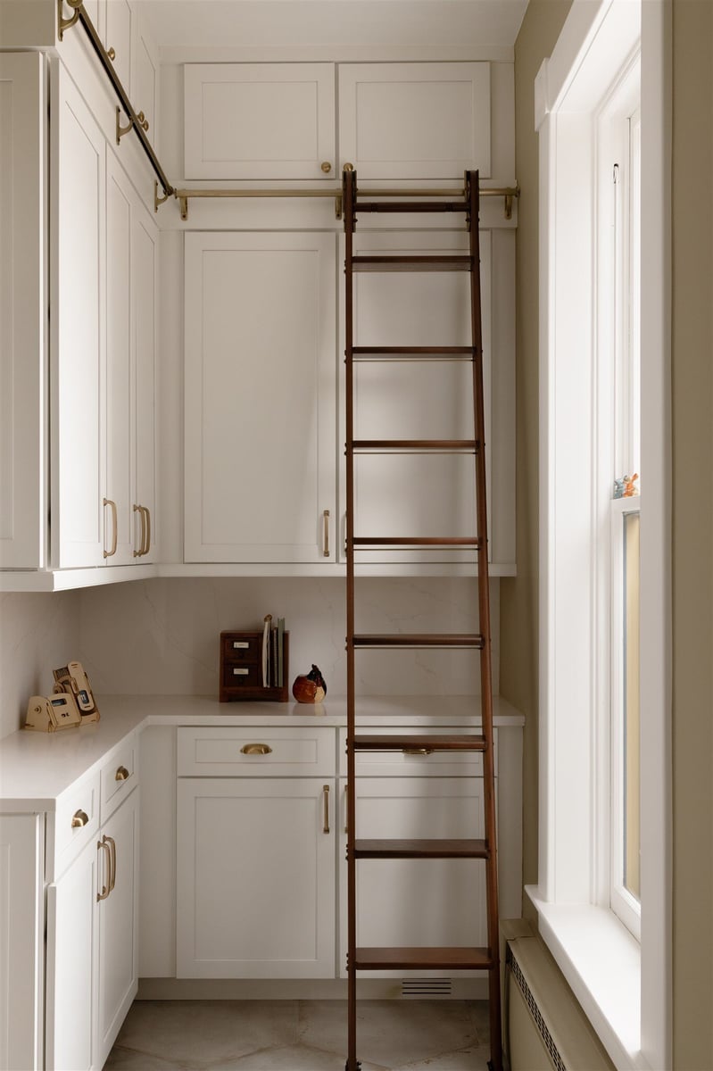 butler pantry with a ladder
