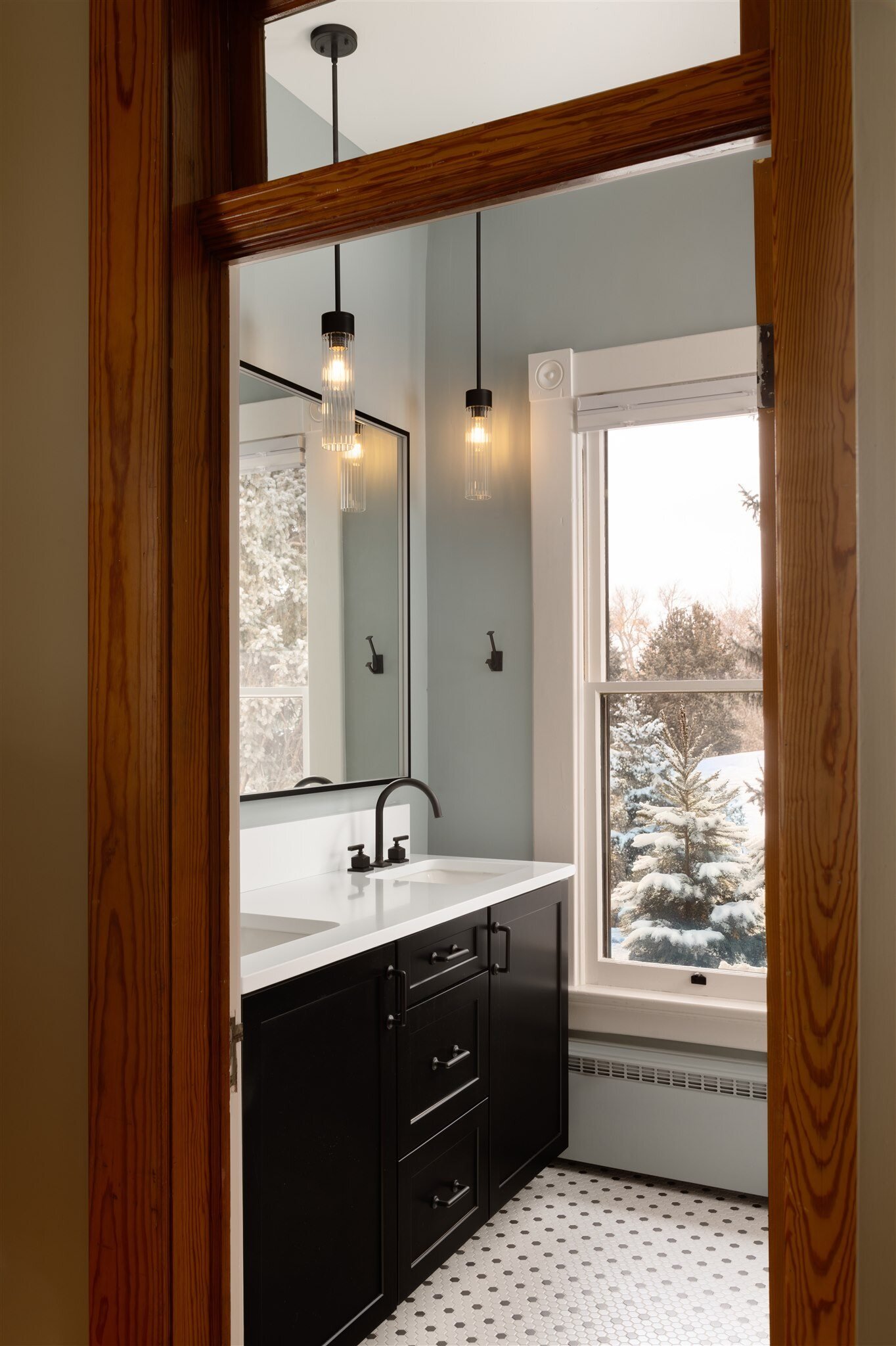 guest vanity with black fixtures