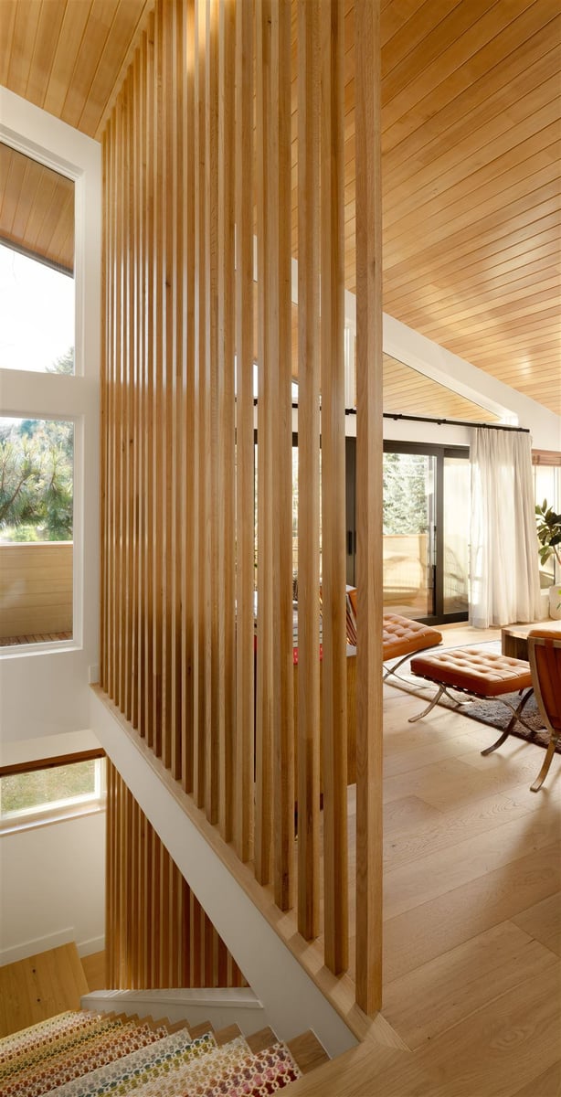 22' slat wall in a great room that extends down to the main level